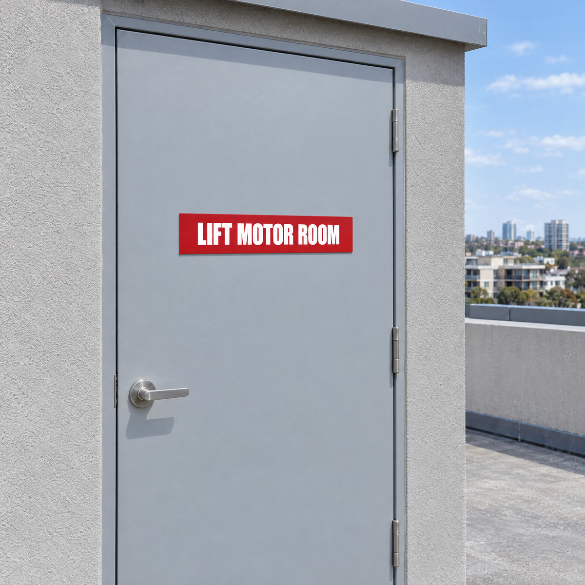 Red and white Lift Motor Room sign on a lift motor room door on an Australian rooftop