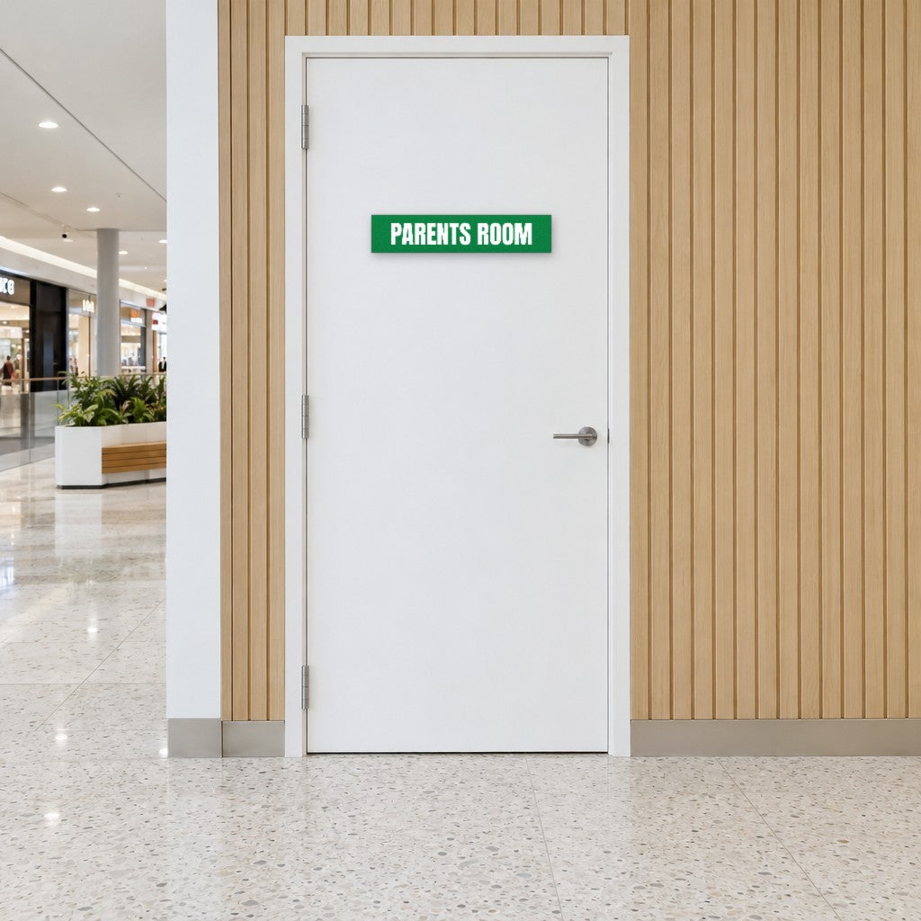 Green and white Parents Room sign on a parents room door in an Australian shopping centre