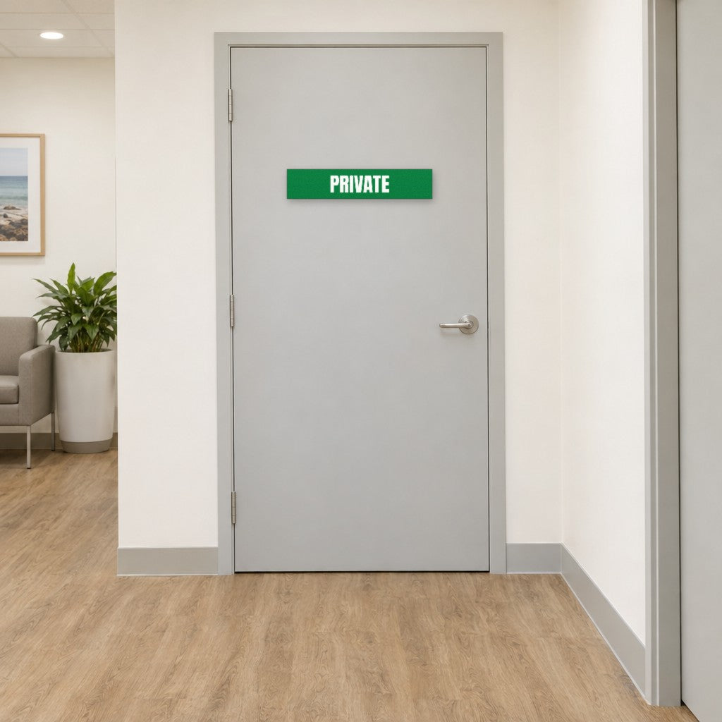Green and white Private sign on a private door in an Australian medical clinic